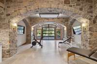 Gym with roll-up door on lower level