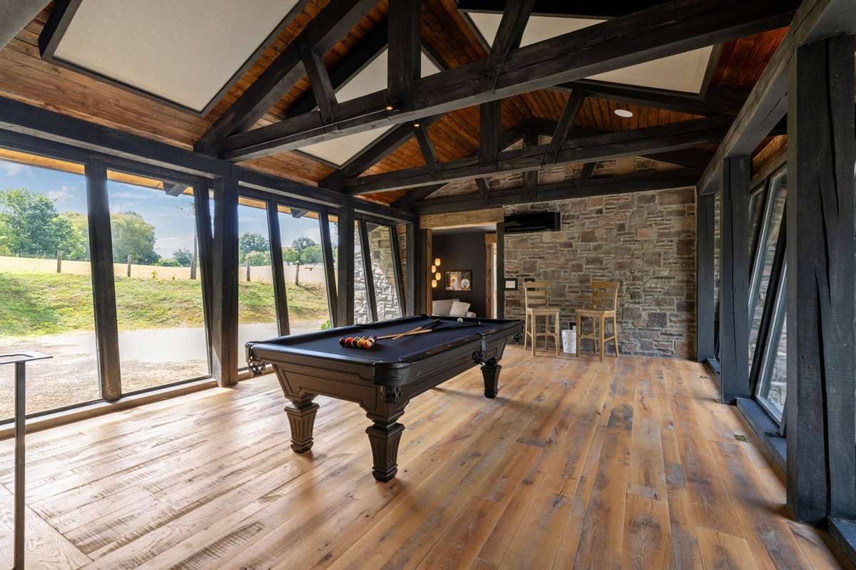 "Skybridge" game room connecting the 2023 built Manor to the Cottage House