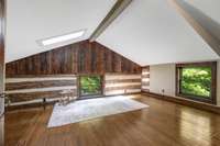 Upstairs bedrooms are generously proportioned; two feature skylights