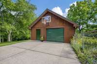 Private basketball area with adjustable height backboard