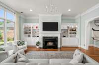 Living room featuring 12 ft ceilings