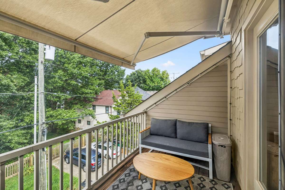 Balcony off the primary with retractable awning