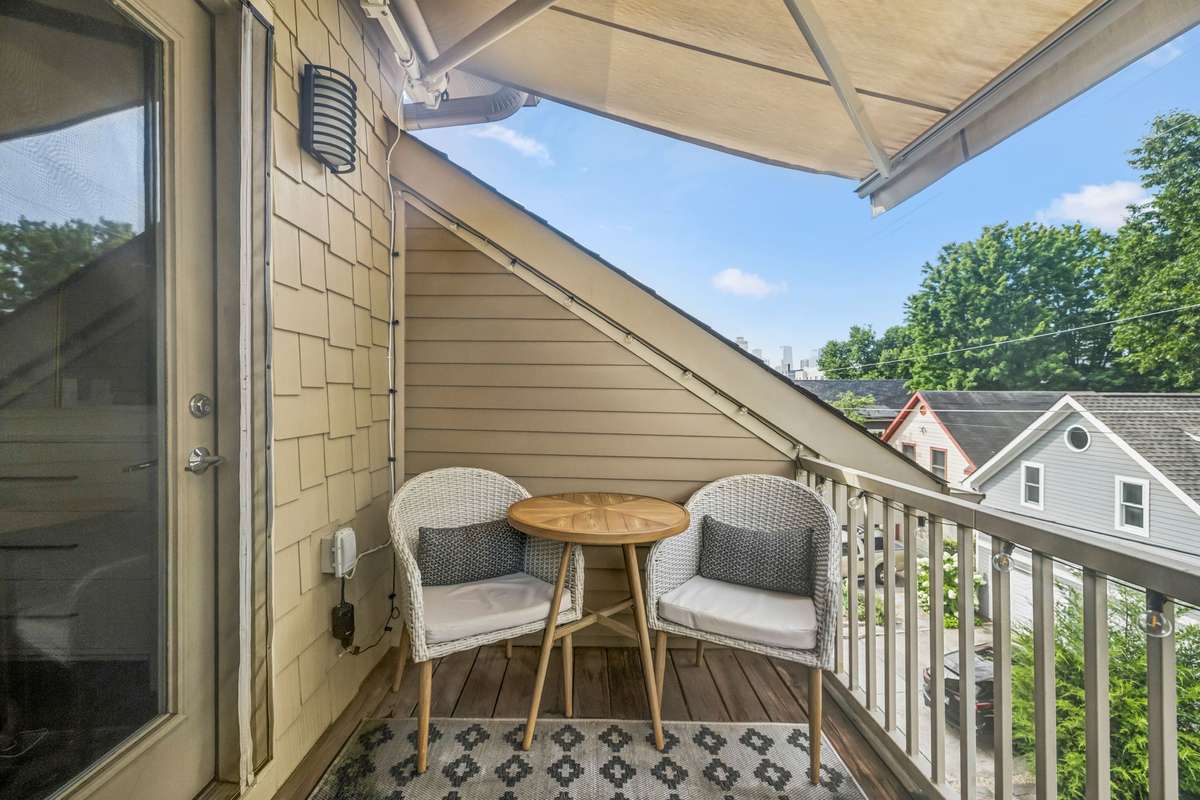 Balcony off the primary with retractable awning