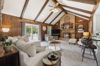 sliding glass doors with internal blinds opens to a large deck