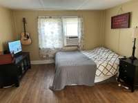 Upstairs Bedroom with Half Bath and Separate Office/Playroom/Nursery and Attic Storage Room