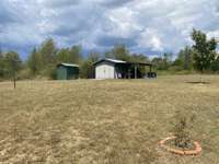 Back yard with extra storage building