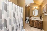 Second Primary bathroom with a spacious walk-in closet.
