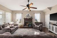To the right of the fireplace, one has direct access to the finished basement.