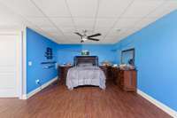 The open floor plan and layout of the basement allows a cove for the "bedroom" while opening up to a large sitting area.