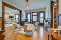 Peaceful natural light courtesy of the oversized original windows (which have been painstakingly restored) bathes the beautiful original flooring.