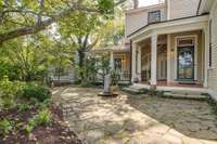 Original cistern sits in this charming court yard