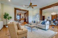 Two massive sets of pocket doors separate this lovely living room from the Entry Parlor and spacious dining room.