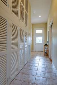 For a historic property - the closet and storage space of this estate is tremendous.  This area, just off the kitchen, works as a mudroom and pantry, in addition to the large pantry in the kitchen.