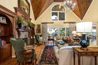 spacious family room with cathedral ceilings