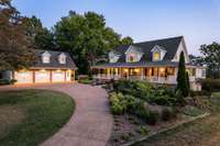 Lovely traditional country home with detached garage...AND a lakeview!