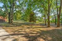 Large flat fenced in back yard