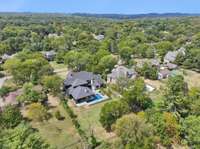 This aerial shot says it all. And once the trees mature along your fence, you'll have even more privacy!