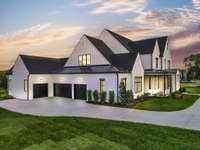 4-car garage 1612 Rosebrooke Drive (Lot #16) Built By Schumacher Homes  *this home is under construction