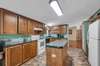 Kitchen with island. Appliances remain