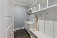 First floor laundry room with mudroom area