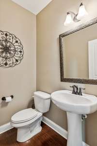 The powder room is located on the main level.