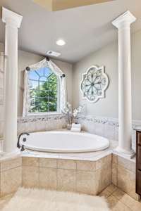 The garden tub is the perfect place to sit and relax after a long day!