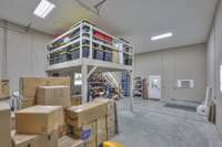 DETACHED GARAGE VIEW FROM TALL OVERHEAD DOOR