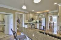 KITCHEN VIEW TOWARDS BONUS ROOM ENTRY