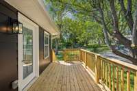 Shaded deck off of the living space offers a great place for quiet, caffeine induced mornings.