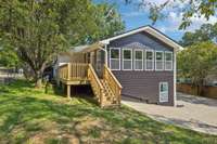 Side deck off of main structure for your morning coffee or a drink after a long days work.