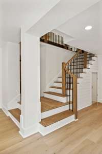 Head down the stairs for more main living space.