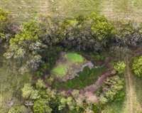 Pond just behind the barn