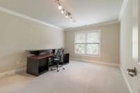 Fourth bedroom upstairs has been used as a music room.