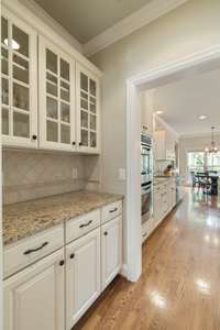 Butler's pantry for additional storage and prep area.