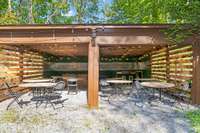 Currently set up for al fresco dining for a group of guests, the additional two-car carport could easily be used as a space for vehicles, or turned into a workshop, storage, or whatever you may need.