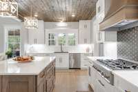 Under cabinet lighting gives this kitchen a beautiful glow!