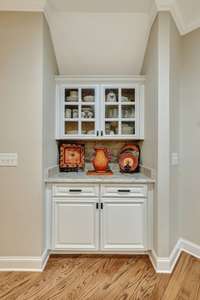 Butlers pantry provides additional storage~Use as a coffee bar ,beverage center or drop zone~Spacious closet between the butlers pantry & dining room holds all the miscellaneous household odds & ends.