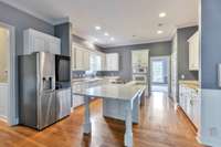 Nice size kitchen with lots of counterspace and cabinets! And there is a pantry!