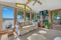 Sunroom has access to oversized deck.