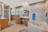 Master bath has walk-in closet and his and hers separate vanities.