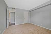 Primary Bedroom with walk-in closet.