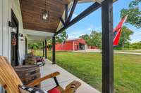 A view from your front porch The ceilings have corrugated metal and red oak