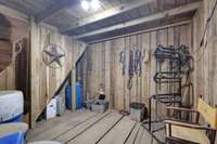 Tack room with overhead loft