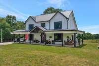 The master bedroom offers an exit directly onto the porch  from the north side of the house