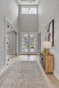 Another View of the Large Foyer and Glass Front doors.