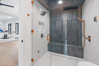 Kohler steam shower with double shower heads.