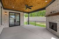 The first floor covered living with fireplace.