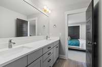 Spacious jack-and-jill style bathroom between the two secondary bedrooms