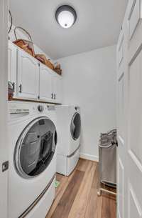 Large utility room with built-in cabinets