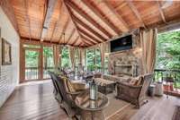 Custom screen porch with vaulted ceiling accessable from main floor den